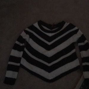 Long sleeve sweater with black and white stripes